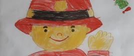 Zdjęcie przedstawia rysunek strażaka wykonany przez przedszkolaków. Na rysunku widnieje napis „Dziękujemy Wam”.