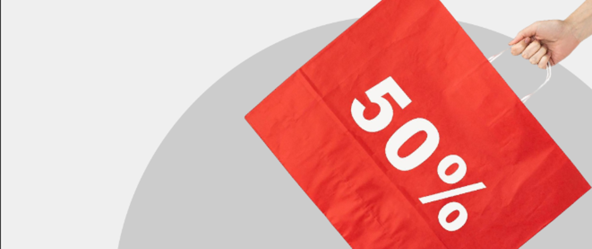 Banner - torba z napisem 50% na szarym tle. 