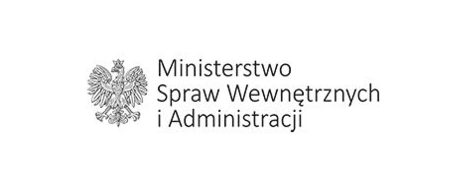 Na zdjęciu widać godło oraz napis Ministerstwa Spraw Wewnętrznych i Administracji
