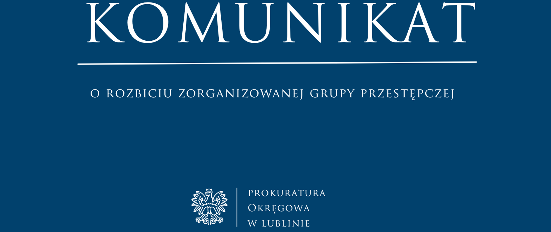 Niebieski baner o treści: Komunikat o rozbiciu zorganizowanej grupy przestępczej