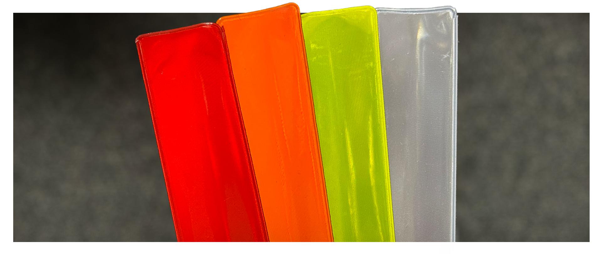 opaski odblaskowe w 4 kolorach, czerwona, pomarańczowa, żółta i biała