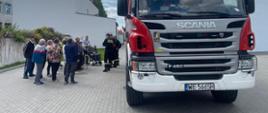 Strażacy z wizytą w Powiatowym Centrum Opiekuńczo Mieszkaniowym w Mławie.
