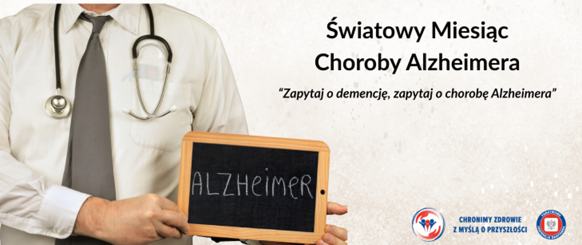 Grafika przedstawia lekarza w białym fartuchu i ze stetoskopem przewieszonym na szyi. W ręku trzyma małą czarną tablicę kredową w drewnianej ramce. Na tablicy widnieje napis Światowy Miesiąc Choroby Alzheimera "Zapytaj o demencję, zapytajo chorobę Alzheimera". W prawym dolnym rogu umieszczono dwa logo Inspekcji Sanitarnej oraz napis Chronimy zdrowie z myślą o przyszłości. 