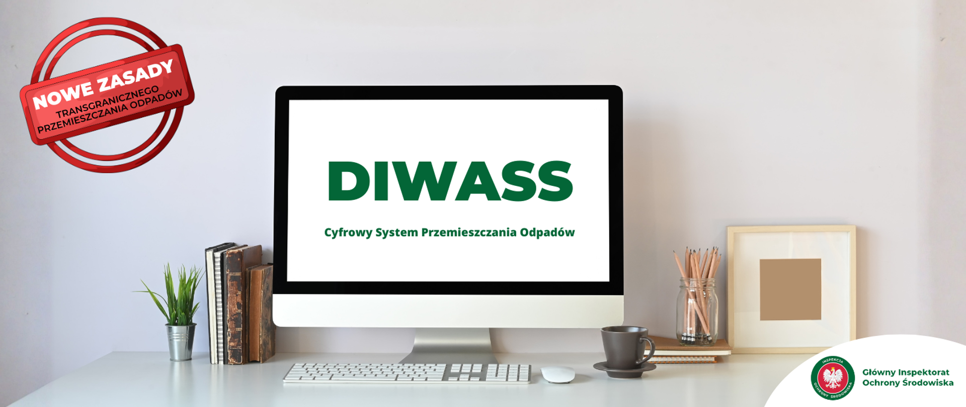 Monitor z wyświetlonym napisem DIWASS Cyfrowy System Przemieszczania Odpadów