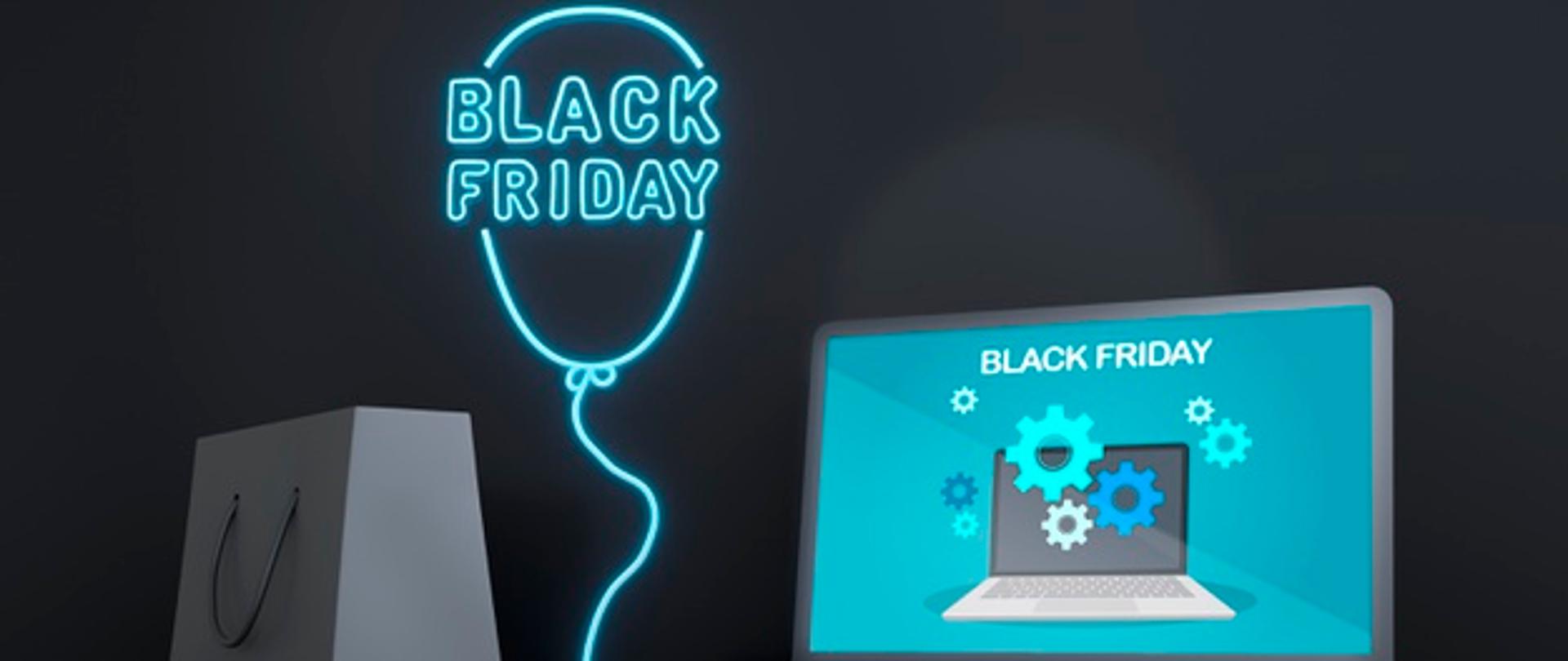 Napis Blacck Friday , obok monitor komputera i słuchawki