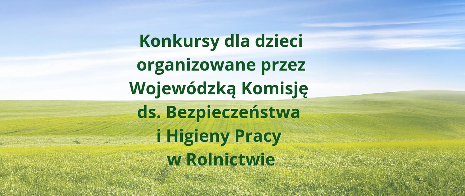 Na tle zielonych wzgórz i błękitnego nieba ciemnozielony napis „Konkursy dla dzieci organizowane przez Wojewódzką Komisję do spraw Bezpieczeństwa i Higieny Pracy w Rolnictwie"