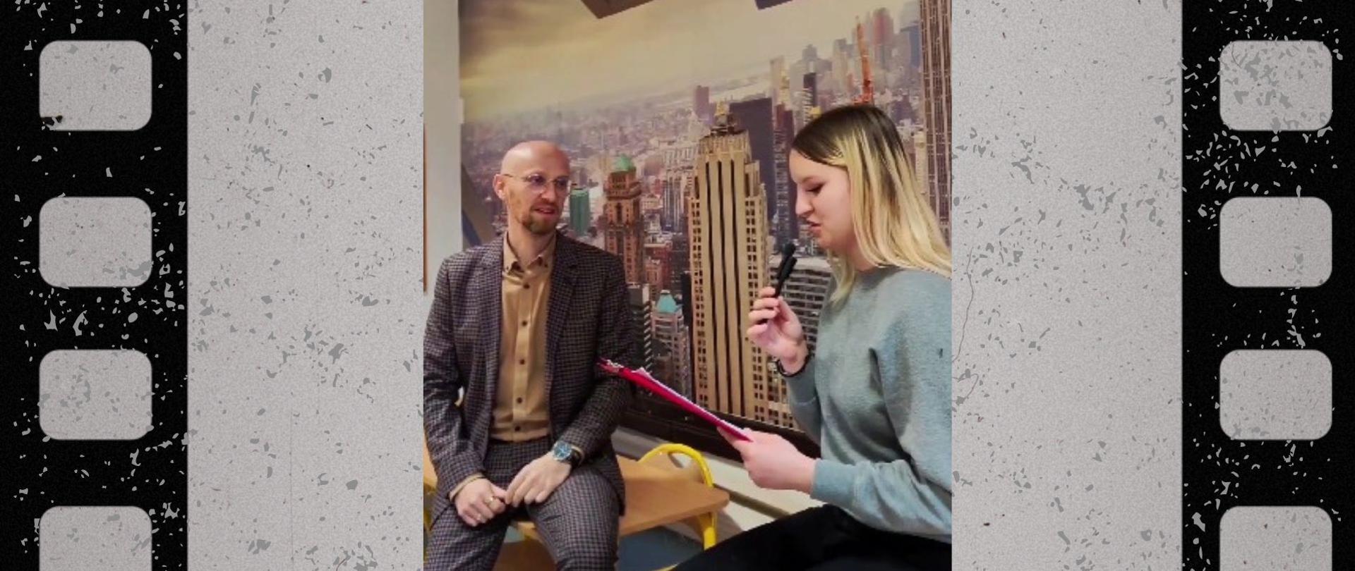 Mężczyzna w garniturze udziela wywiadu młodej dziewczynie.