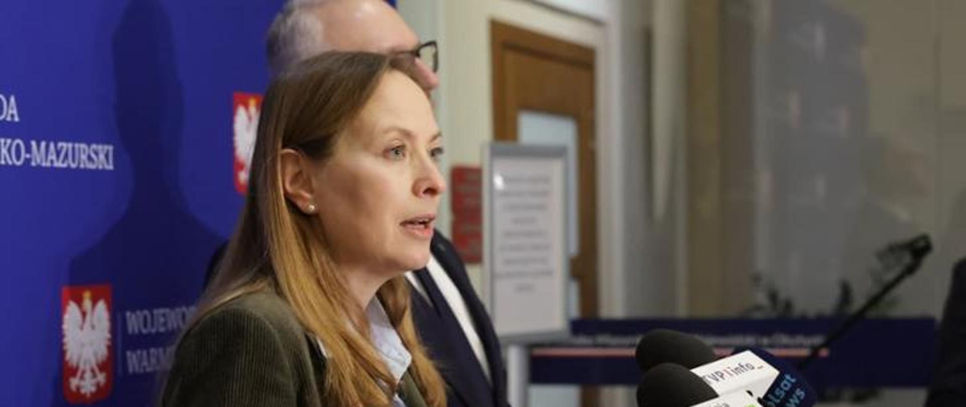 In the photo: Minister Katarzyna Pełczyńska-Nałęcz in front of the microphone