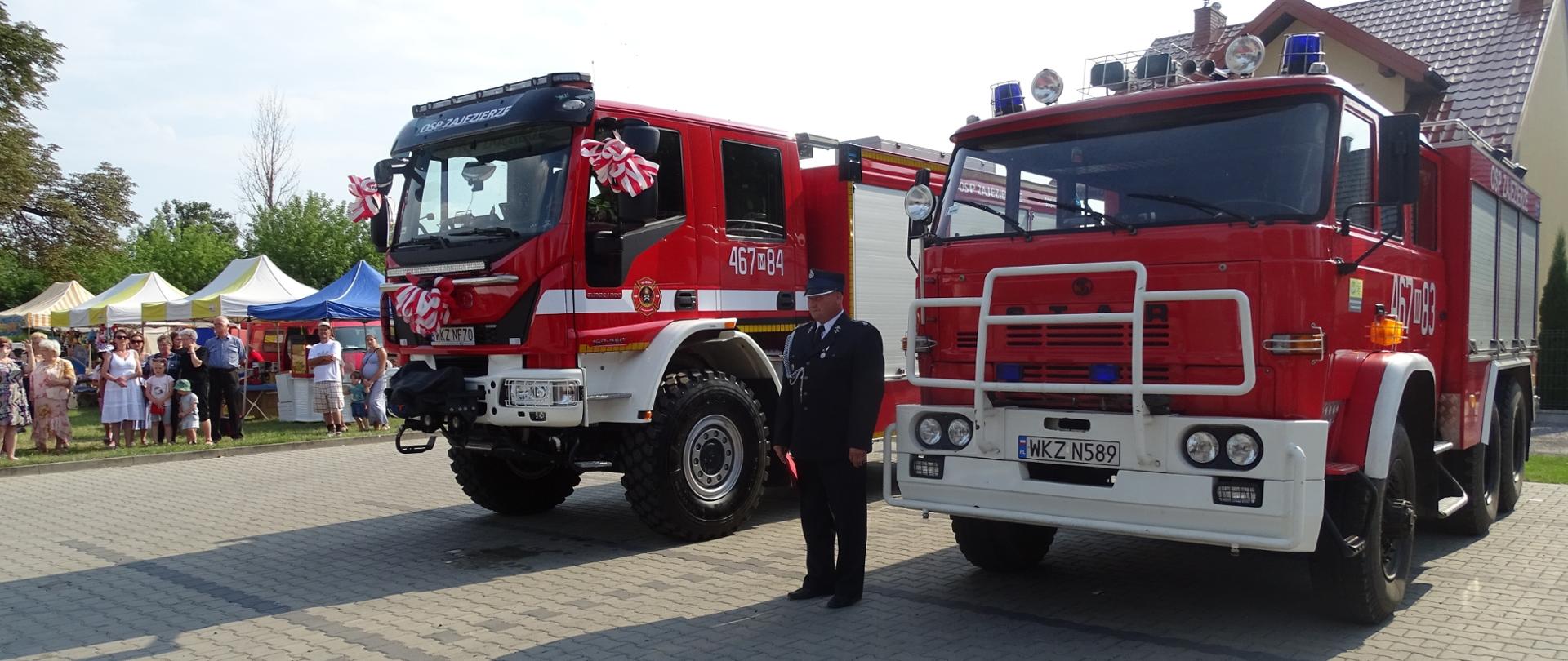 dwa samochody pożarnicze na placu OSP Zajezierze