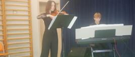Amelka, skrzypaczka z akompaniamentem Maksa wykonuje sonatę W.A.Mozarta.