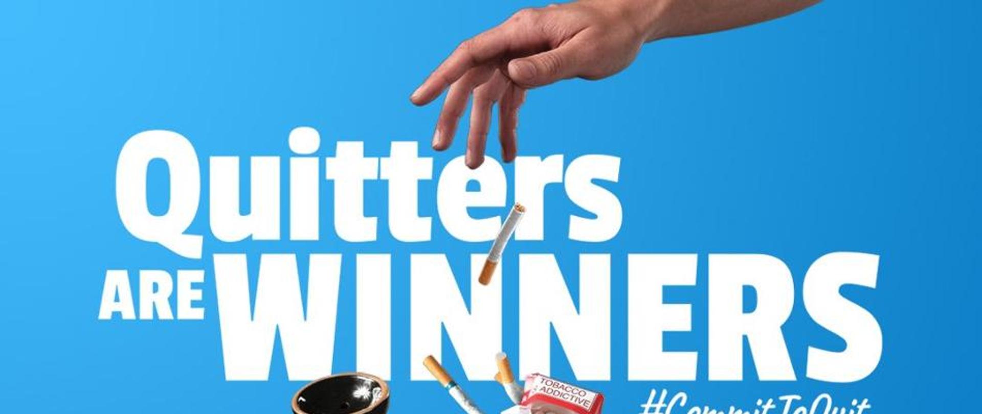 Baner - Ręka wyrzucają papieros, na niebieskim tle hasło: Quitters are winners