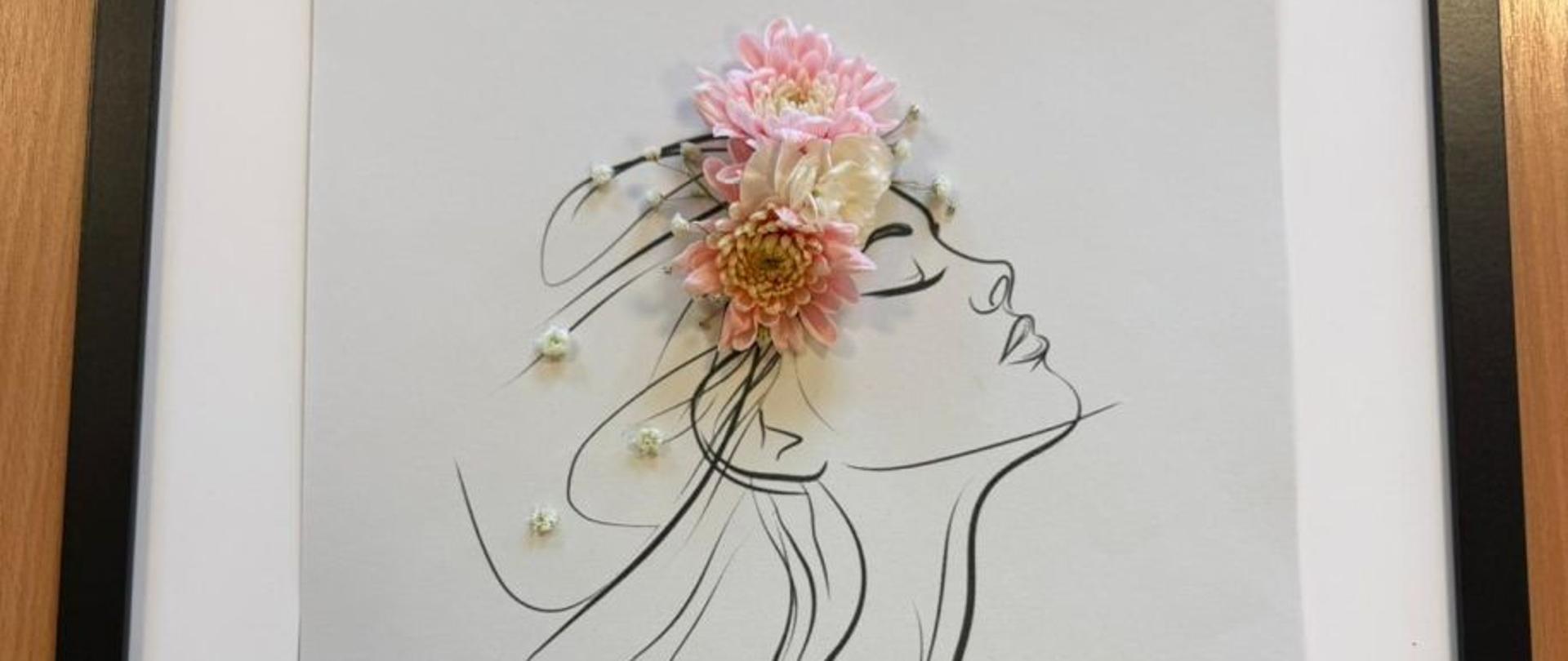 Portret kobiety - artstyczne połączenie rysunku i dekoracji roślinnych