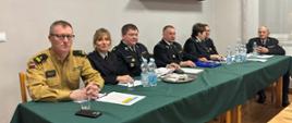 Na zdjęciu Komendant Powiatowy PSP w Jędrzejowie podczas zebrania sprawozdawczo-wyborczego OSP wraz z zarządem OSP Przełaj.