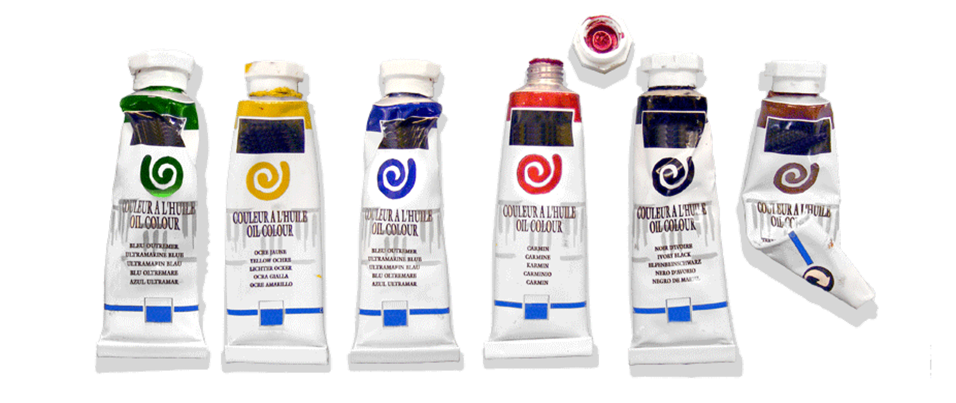 leczące w rzędzie tubki z farbą, czwarta lewej jest odkręcona, zakrętką leży obok, ostatnia jest wyciśniętą