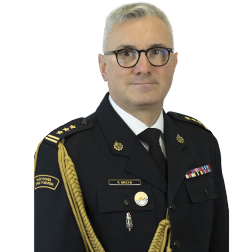 zdjęcie przedstawia zastępcę komendanta wojewódzkiego Państwowej Straży Pożarnej we Wrocławiu starszego brygadiera Piotra Grzyba