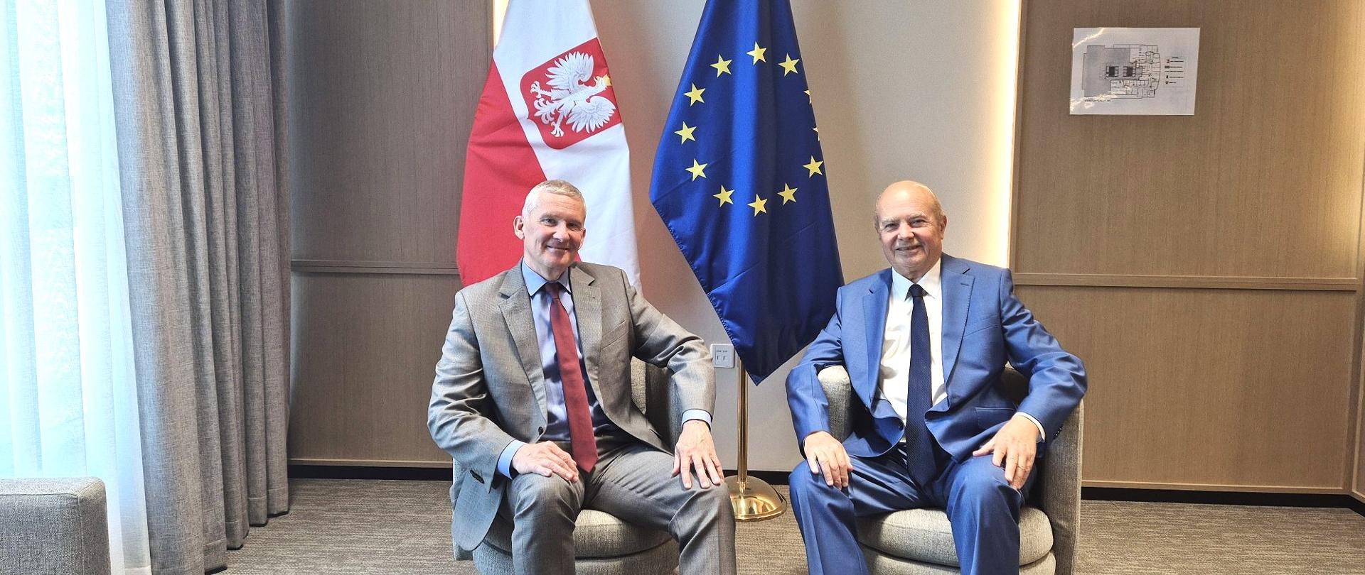 On the photo, charge d'affaires Grzegorz Gawin is sitting next to IRIS media journalist.