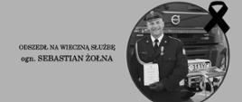 Zdjęcie czarno-białe przedstawia strażaka ogn. Sebastiana Żołny który odszedł na wieczną służbę. 