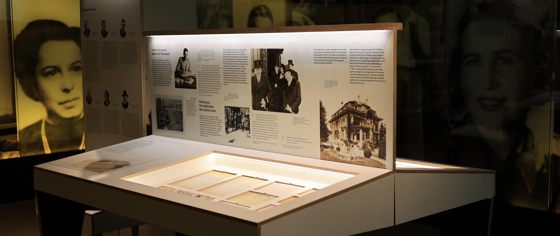 Exhibition Passport for Life in Los Angeles, exhibition table with documents, board with the information about the exhibition, places in the gallery 6, one of the rooms at the Holocaust Museum LA