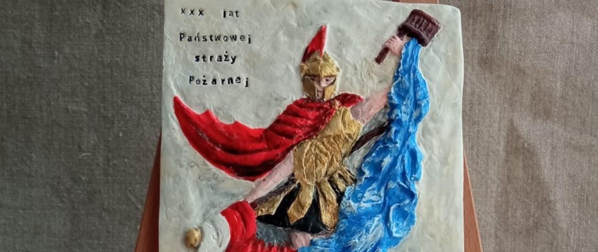 Okolicznościowa płaskorzeźba św. Floriana