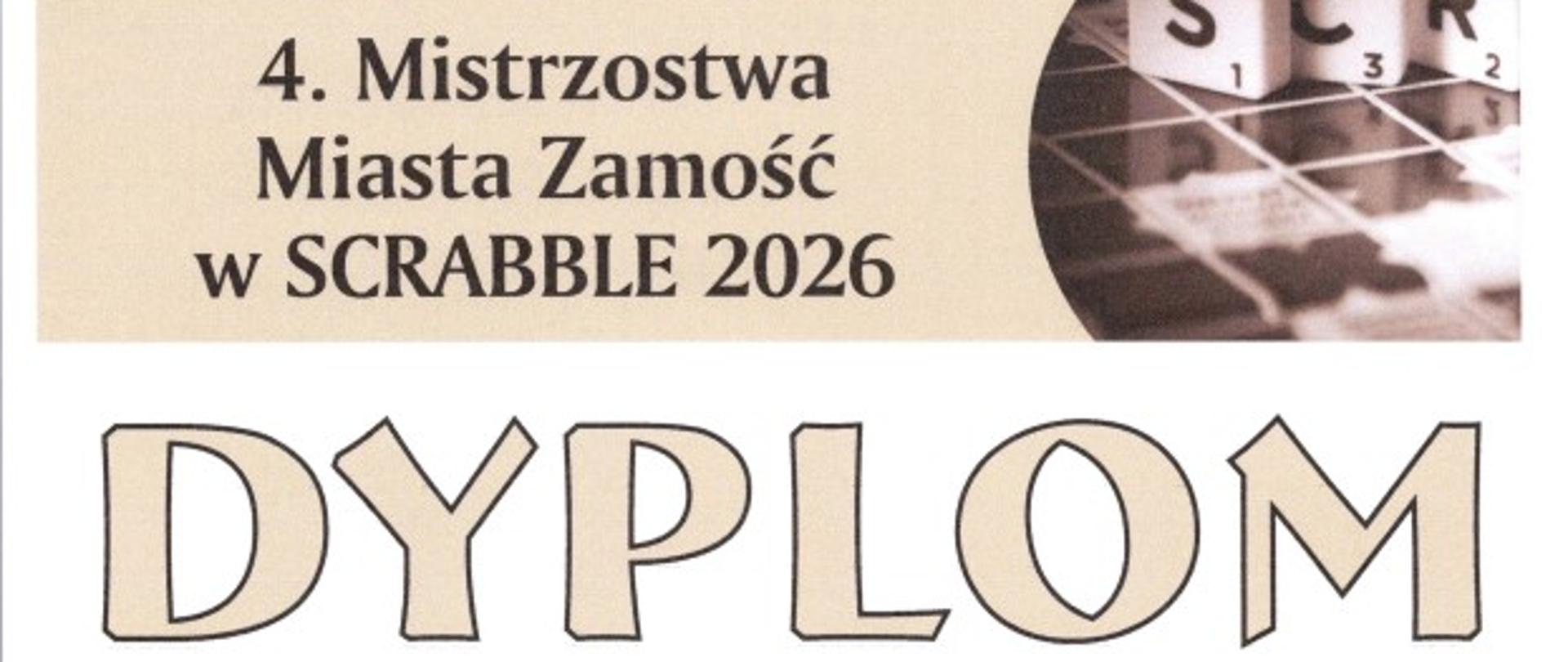 dyplom , na białym tle napisy i grafika niebieskiej szkolnej tarczy