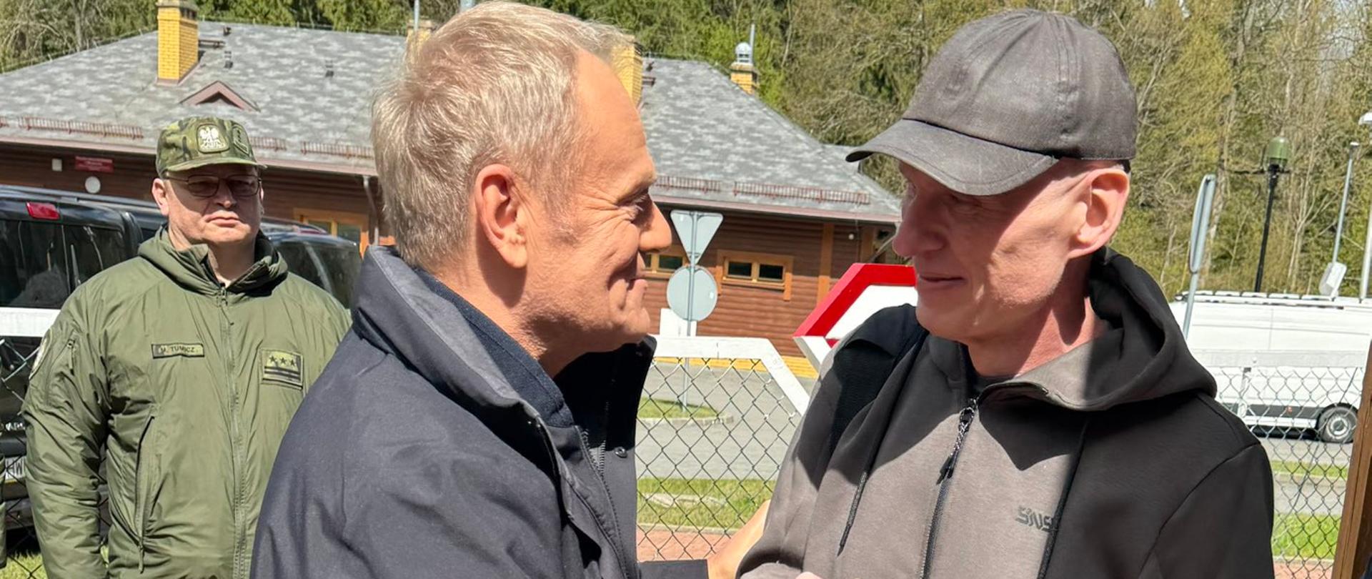 Premier Donald Tusk z Andrzejem Poczobutem