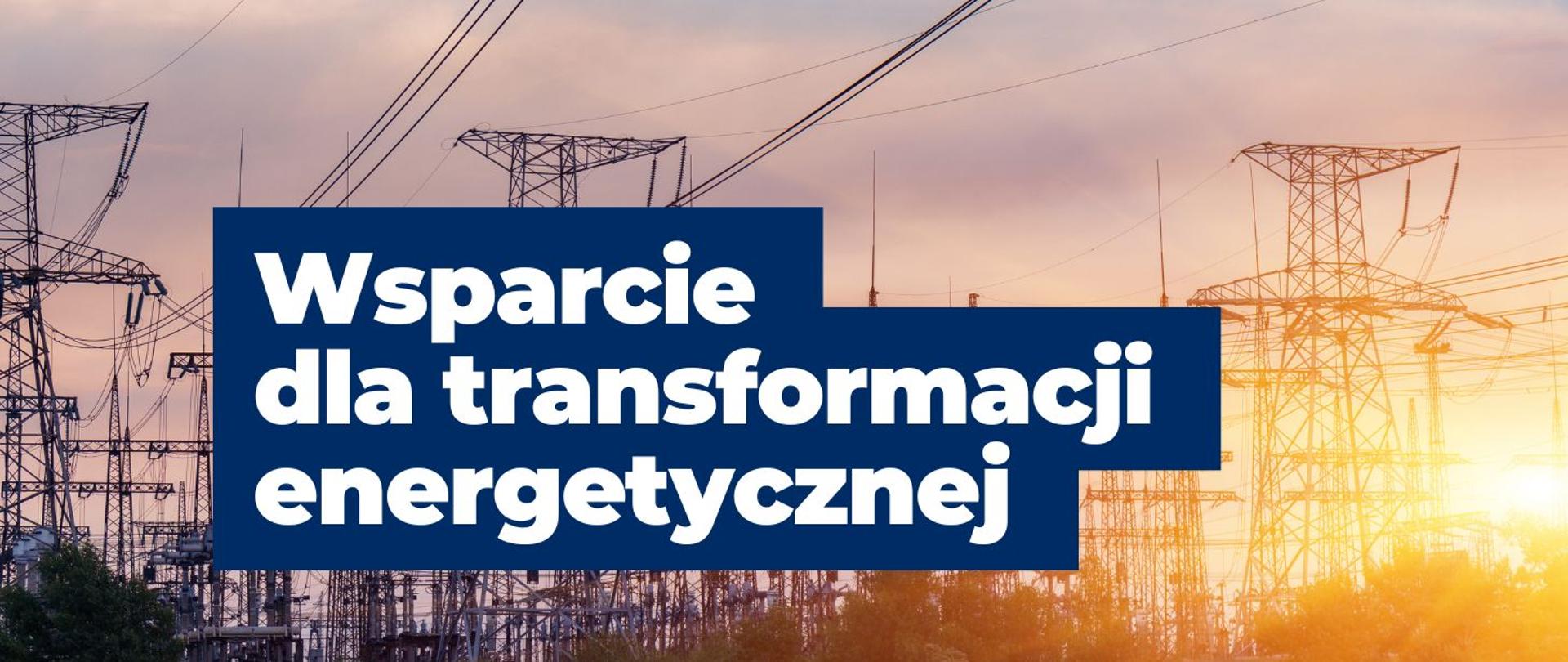 baner z napisem wsparcie dla transformacji energetycznej. Na tle napisu widać linie energetyczne o wschodzi słońce.