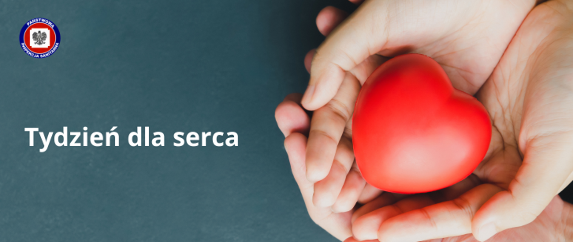 Po prawej dłoniach leży czerwone serce, na ciemnoszarym tle jasny napis "Tydzień dla serca". W lewym górnym rogu logo Państwowe Inspekcji Sanitarnej.