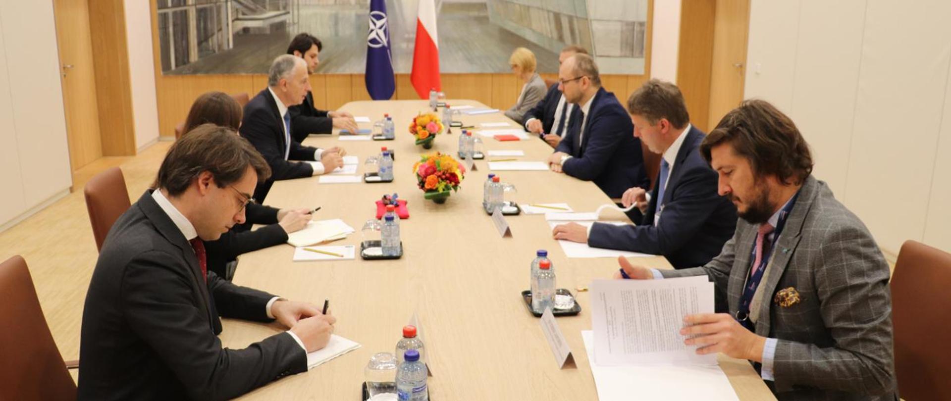 Participants of the meeting sitting at the table