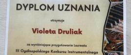 Dyplom Violety Druliak za wyróżniające przygotowanie Laureata