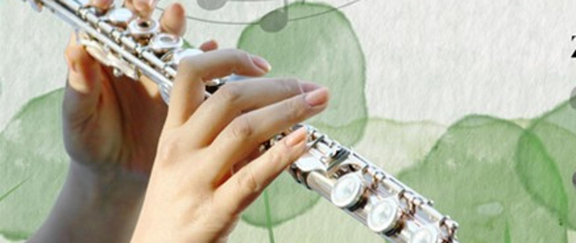 Plakat przedstawia informację o organizowanych warsztatach fletowych w dniu 28 listopada 2022 o godzinie 11 do 18 w sali kameralnej Państwowej Szkoły Muzycznej przez panią Karinę Kandzia-Maniak. W dole plakatu flet oraz zielone listki. 