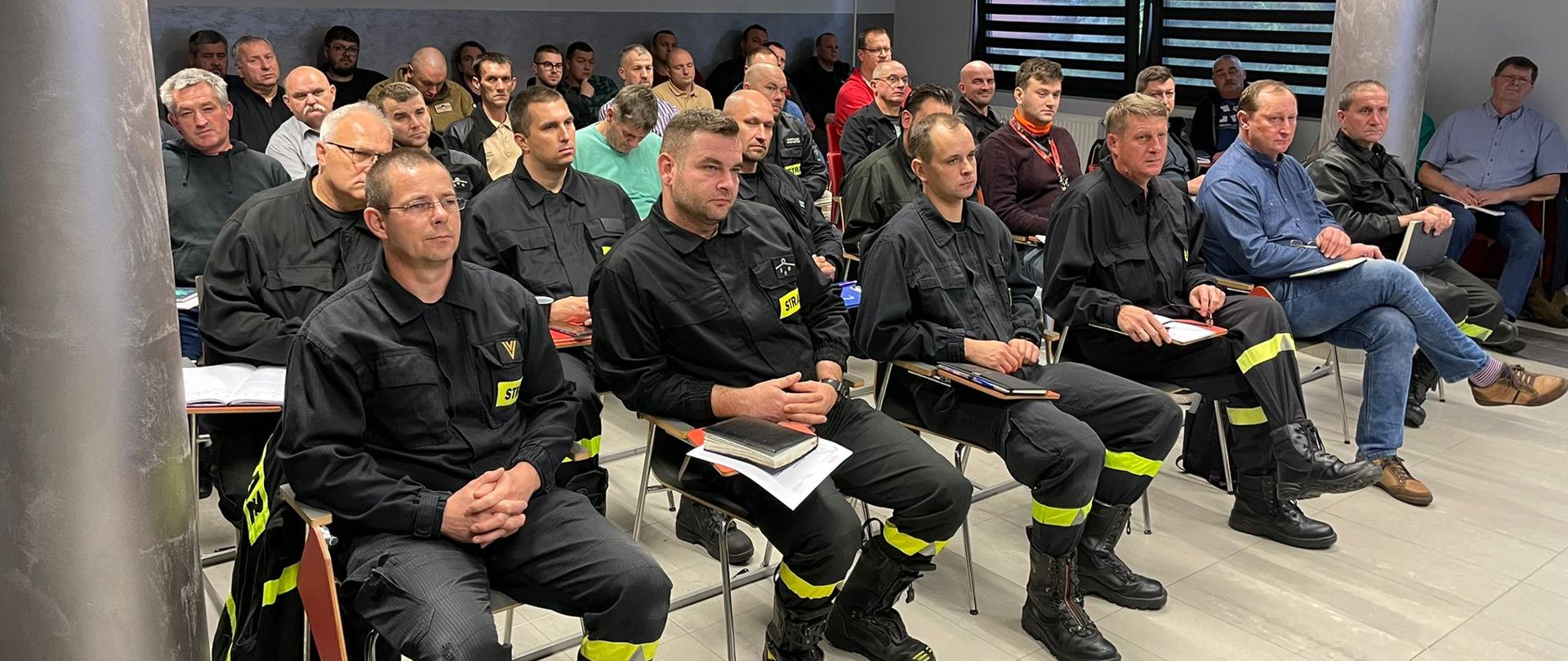 wykład na sali szkoleniowej z metodyki przeprowadzania instruktażu stanowiskowego