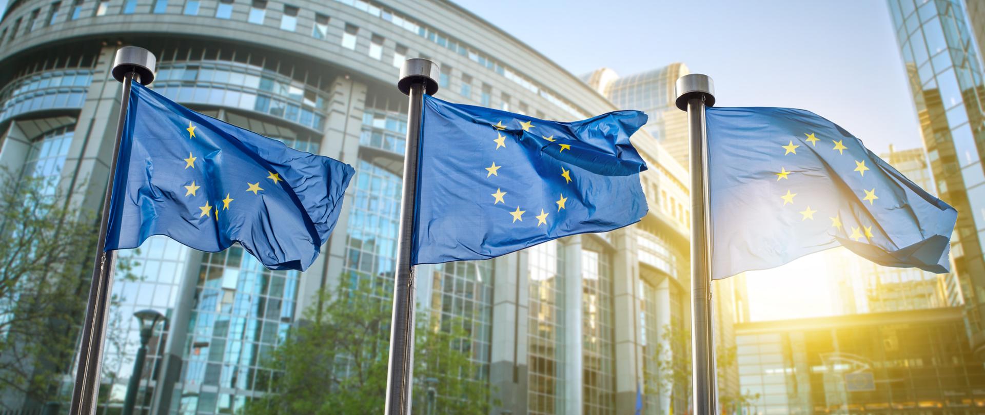 European union flag against parliament in Brussels, Belgium