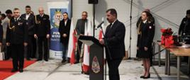 Na zdjęciu Uroczyste zdanie i przyjęcie obowiązków Komendanta Powiatowego Państwowej Straży Pożarnej w Rypinie - Paweł Zgórzyński – Radny Sejmiku Województwa Kujawsko-Pomorskiego w trakcie okolicznościowego przemówienia