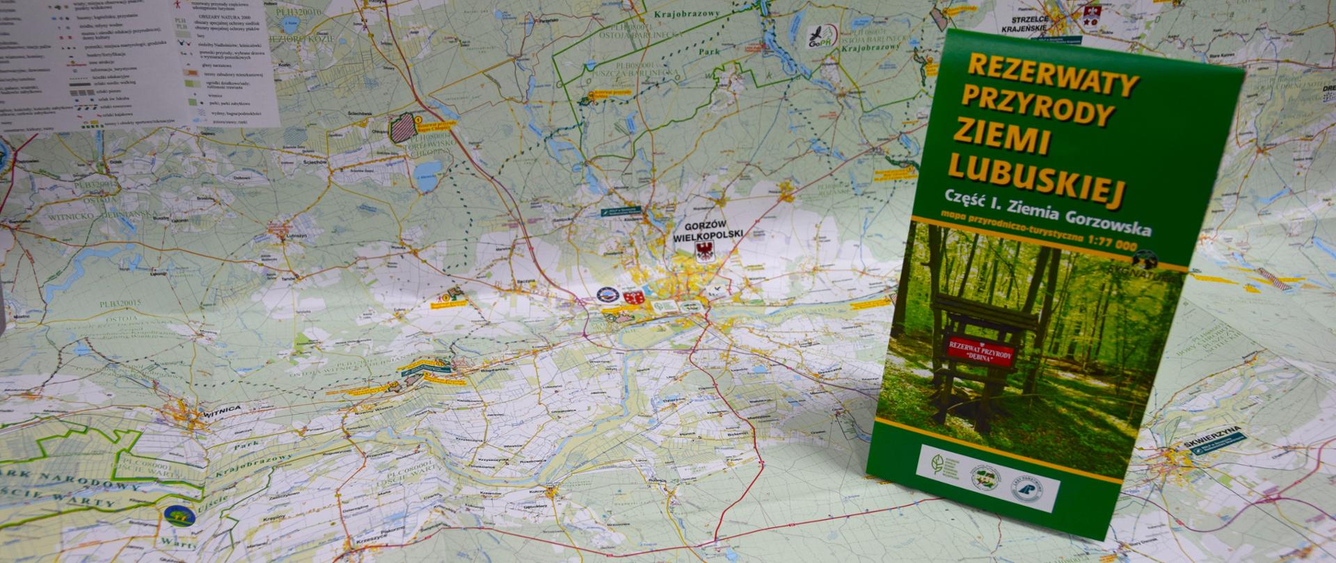 Okładka mapy Rezerwaty Ziemi Lubuskiej. Część I. Ziemia Gorzowska. W tle rozłożona mapa.
