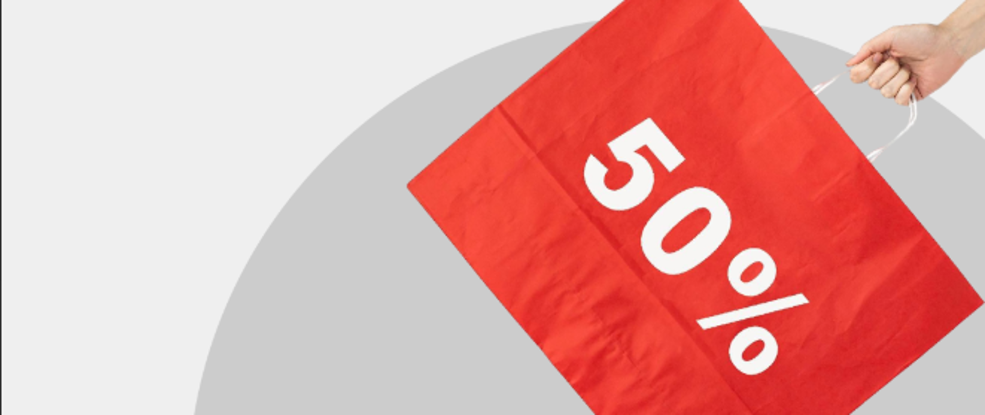 Torba papierowa zakupowa z napisem 50% na szarym tle. 