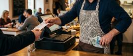 Mężczyzna za kasą w restauracji - zdjęcie wygenerowane przez sztuczną inteligencję
