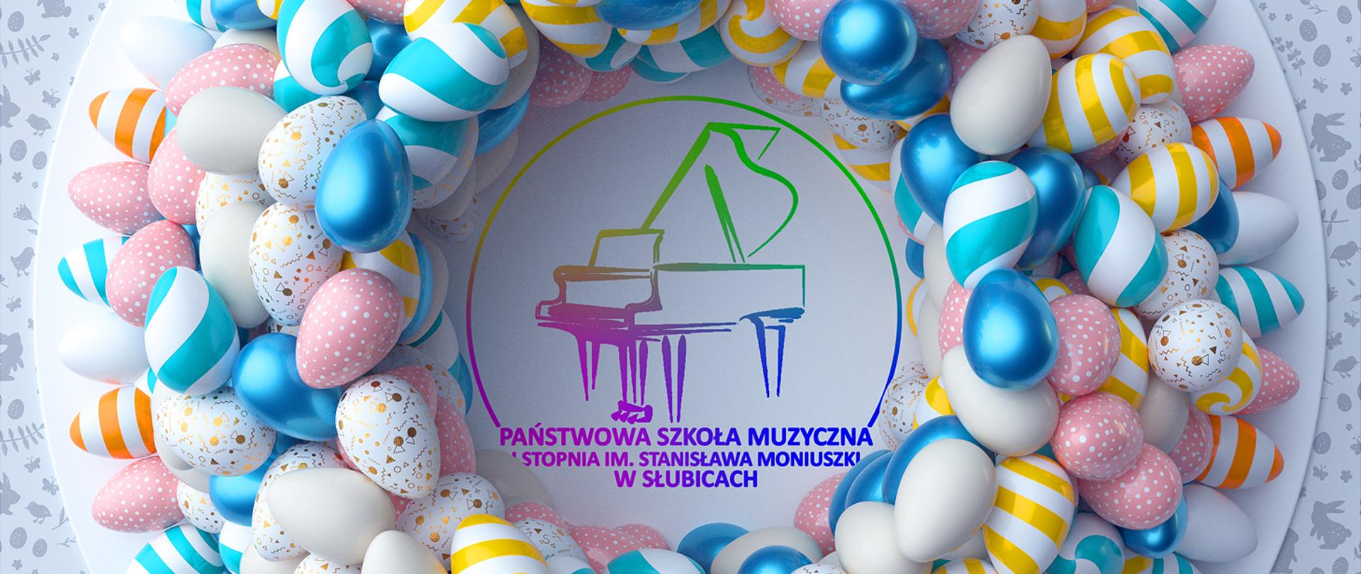 Grafika - na talerzu leżą pisanki, na dnie talerza logo szkoły