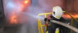 Na zdjęciu strażacy podczas akcji ratowniczo-gaśniczej