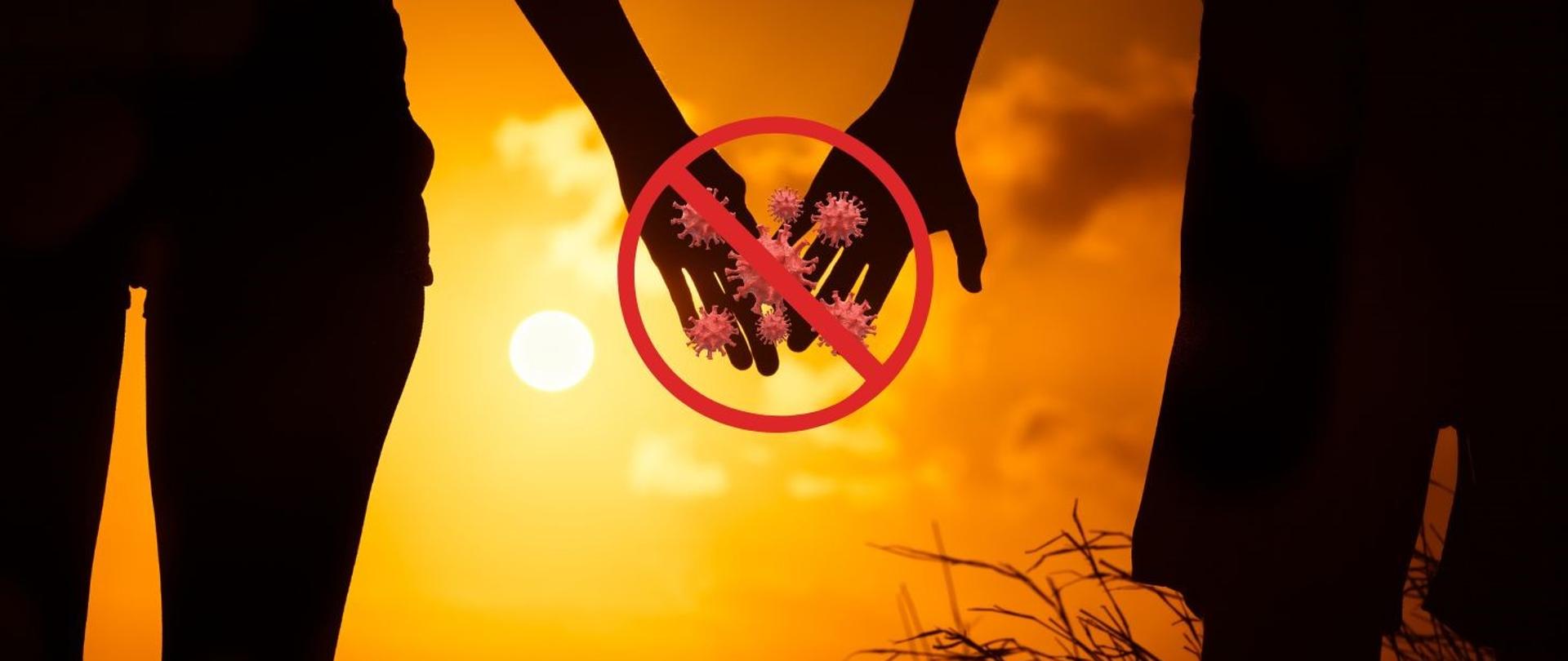 grafika przedstawia parę. Kobieta i mężczyzna trzymają się za ręce. Pomiędzy nimi znajduje się grafika znaku zakazu a w środku tego znaku zdjęcie wirusów jako symbol zakażeń przenoszonych drogą płciową.