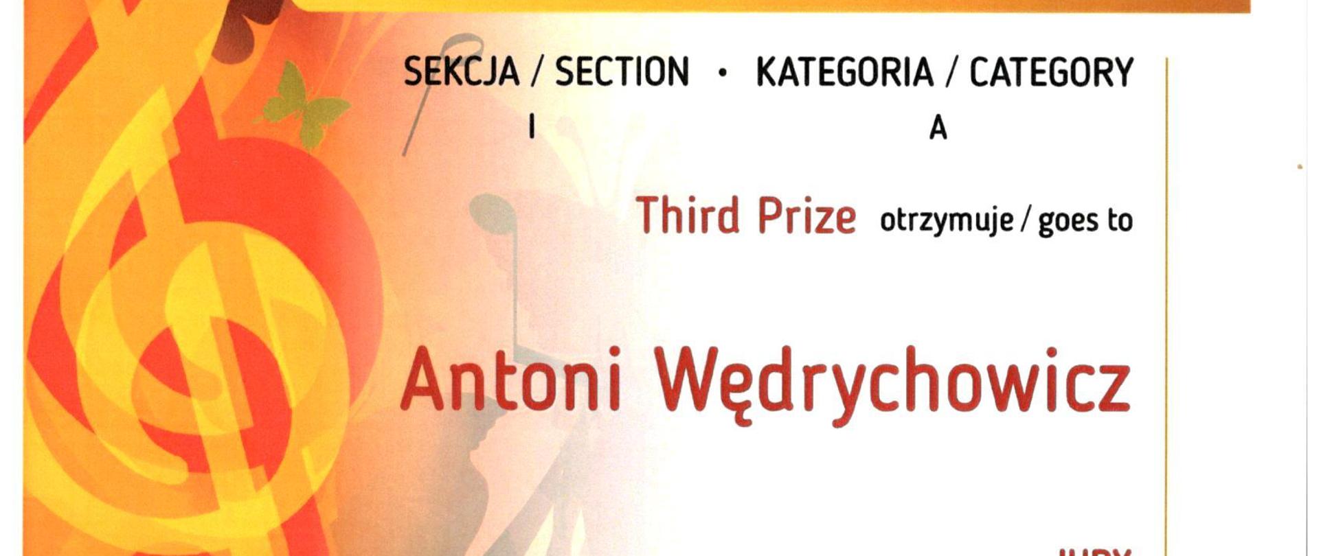 białe tło, z lewej strony pomarańczowo czerwone klucze wiolinowe