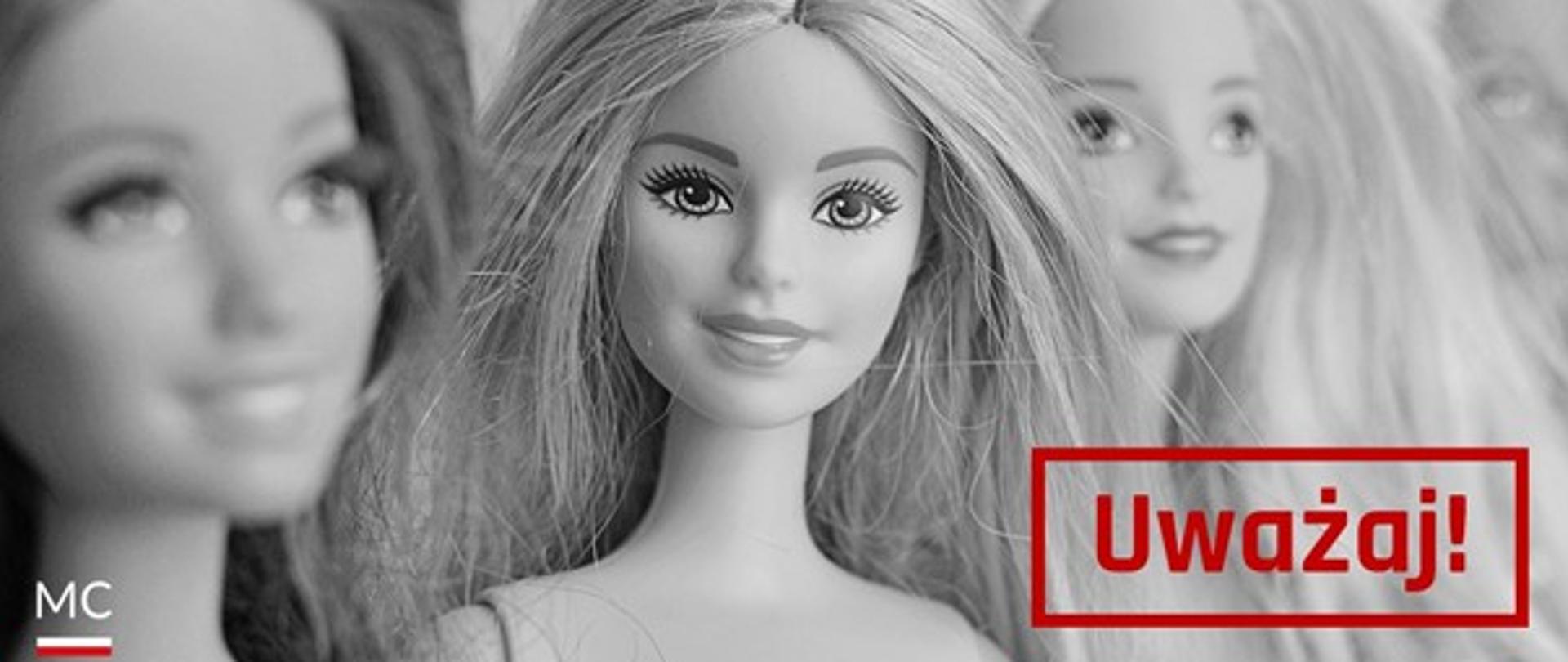 Głowy trzech lalek Barbie