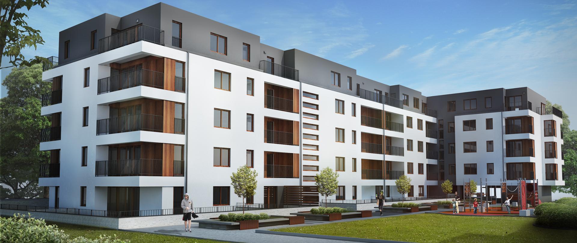 czteropiętrowy blok przed którym widać plac zabaw