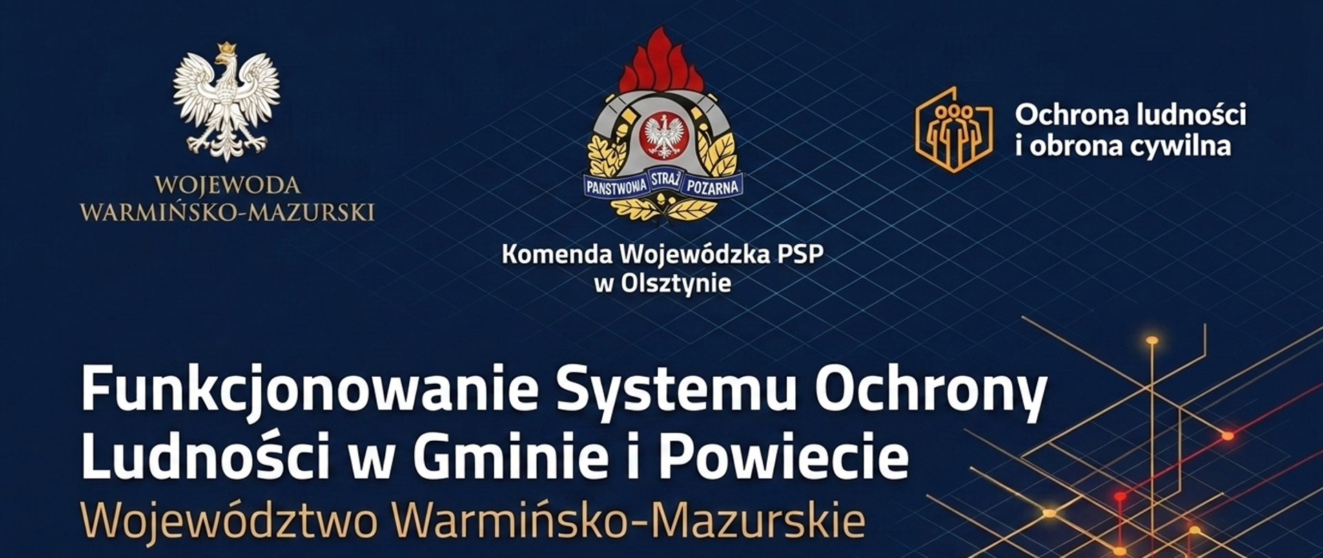 Grafika na banderze przedstawia napis Funkcjonowanie Systemu Ochrony Ludności w Gminie i Powiecie- Województwo Warmińsko-Mazurskie. Dodatkowo u góry mieszczą się herb województwa, logo PSP oraz logo OLiOC