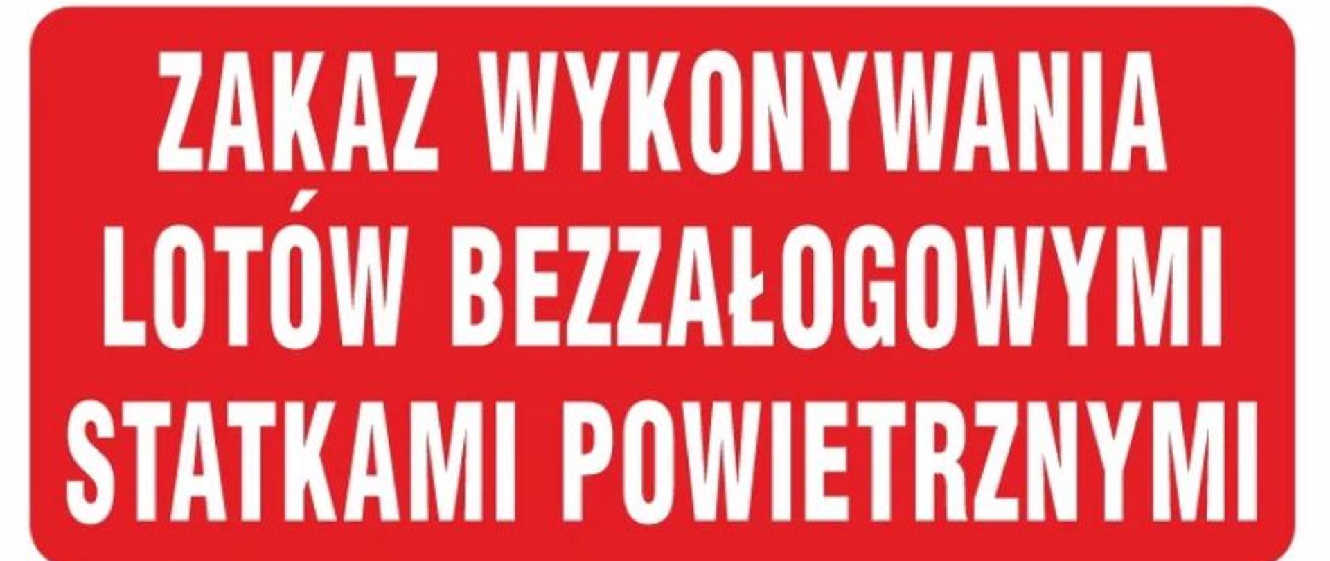 Znak graficzny przedstawiający przekreślony statek powietrzny.
