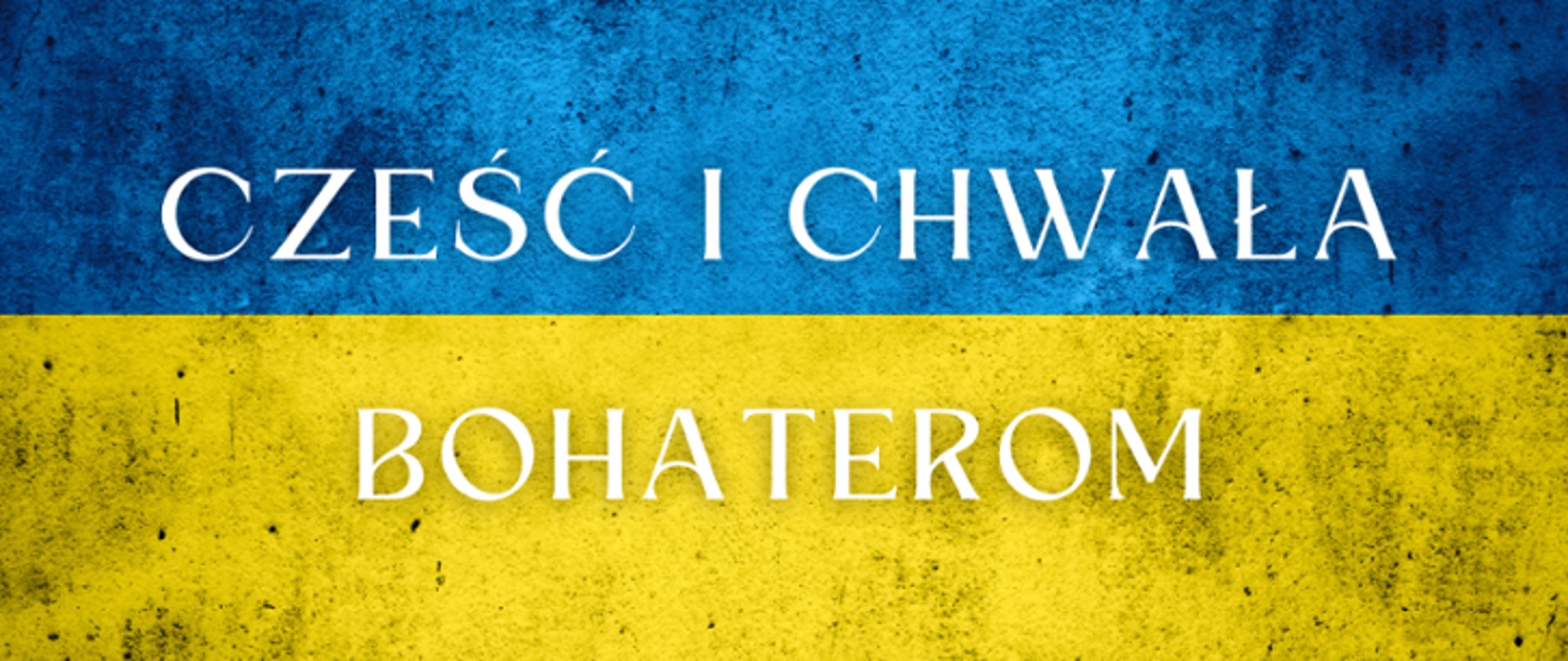 Ukrainska flaga, na niej napis Cześć i Chwała Bohaterom