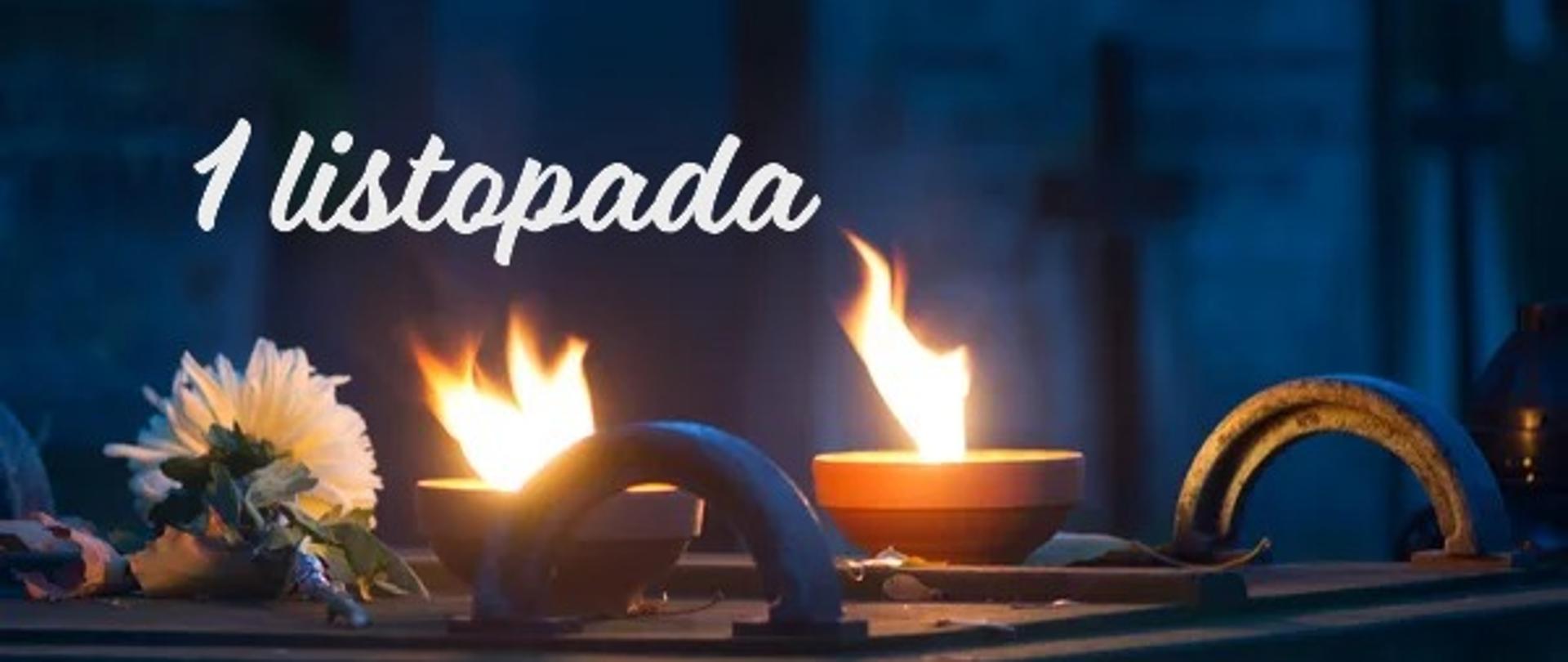 Zdjęcie przedstawia nastrojową scenę z cmentarza, typową dla obchodów 1 listopada – Wszystkich Świętych w Polsce. Na pierwszym planie widzimy nagrobek ozdobiony zapalonymi zniczami, białym kwiatem (prawdopodobnie chryzantemą) oraz opadłymi liśćmi, które podkreślają jesienną aurę. W tle znajdują się inne groby, krzyże i nagrobki, tworząc spokojną, refleksyjną atmosferę.
Napis „1 listopada” umieszczony na zdjęciu jednoznacznie wskazuje na dzień, w którym Polacy tłumnie odwiedzają cmentarze, by uczcić pamięć zmarłych. To czas zadumy, modlitwy i rodzinnych spotkań przy grobach bliskich. Światło zniczy symbolizuje pamięć, nadzieję i duchową obecność, a kwiaty – szacunek i miłość.
