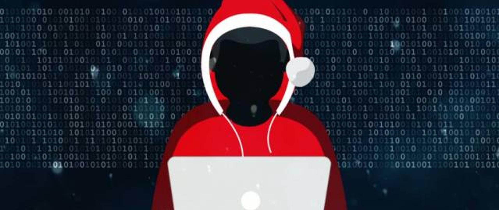 Grafika - postać Mikołaja jako hakera przed laptopem 