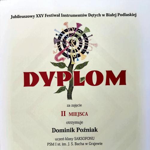 Dyplom z jubileuszowego XXV Festiwalu Instrumentów Dętych w Białej Podlaskiej, przyznany Dominikowi Poźniakowi za zajęcie II miejsca w konkursie. Dokument zawiera dane ucznia.