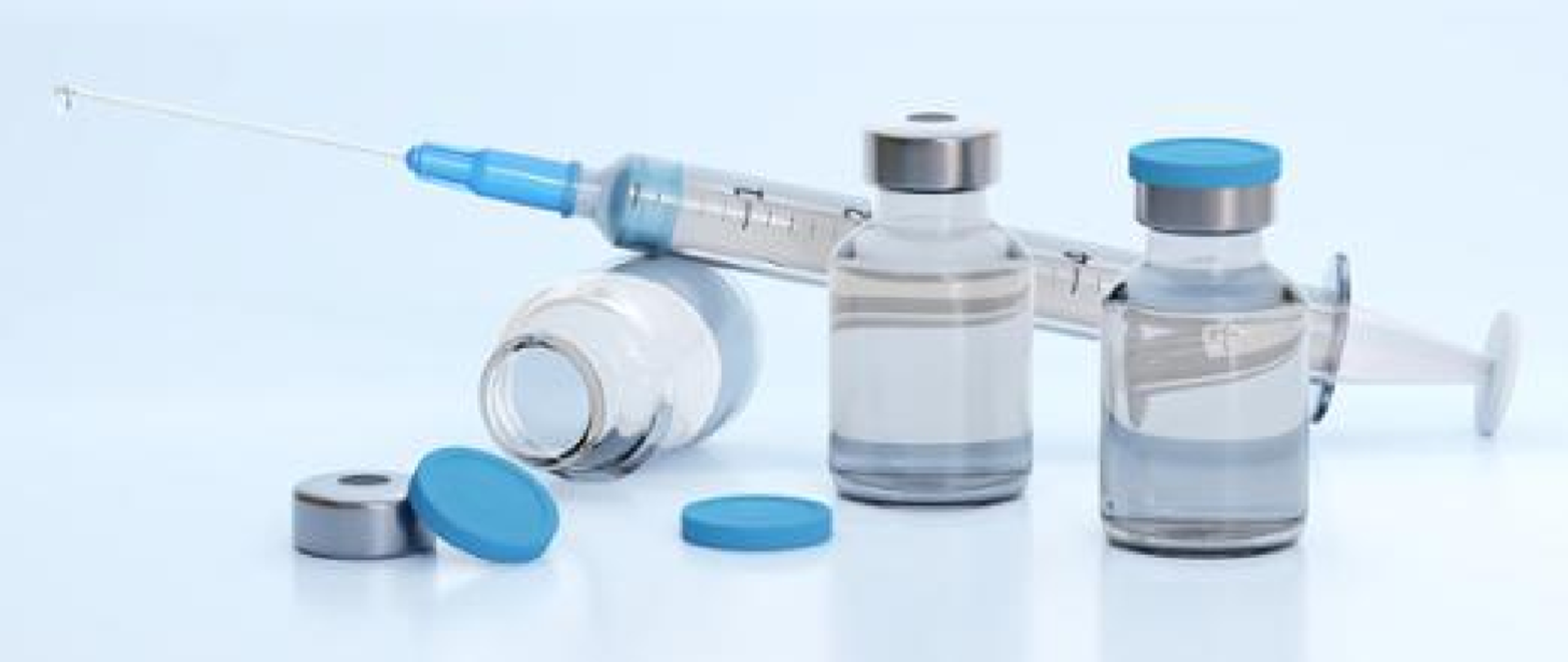 Ampułki i strzykawka ze szczepionkami