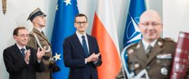 Premier Mateusz Morawiecki i minister spraw wewnętrznych i administracji Mariusz Kamiński podczas uroczystości.